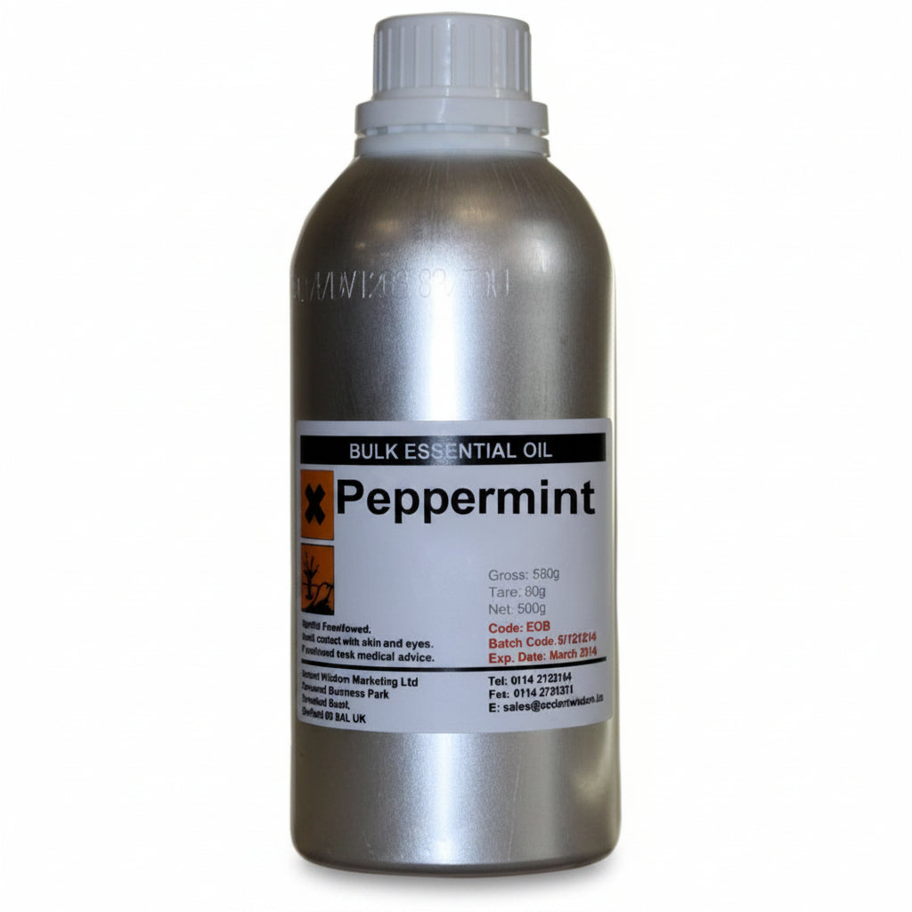 Bottle of peppermint essential oil on a white background